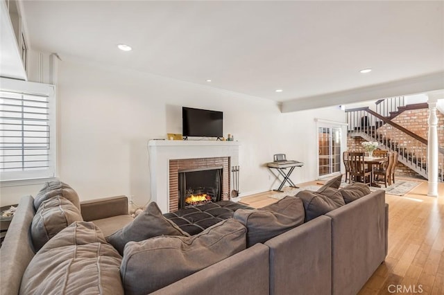 living room with light hardwood / wood-style flooring