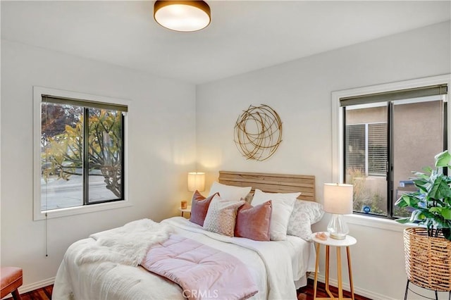 bedroom featuring hardwood / wood-style floors