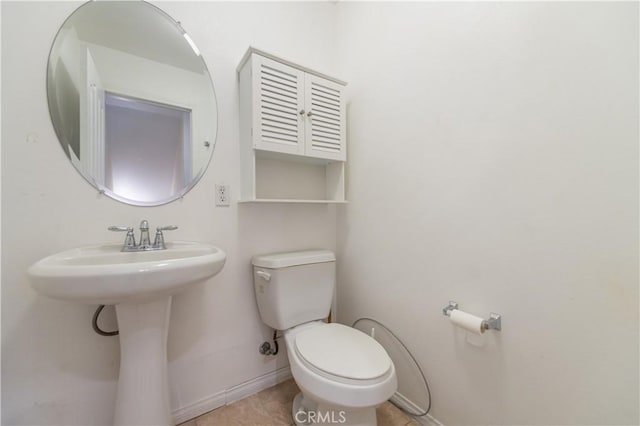 bathroom featuring toilet