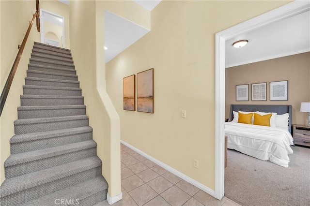13637 Foster Ave Unit 5, Baldwin Park, CA 91706 - stairs with tile patterned floors and baseboards