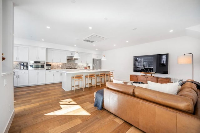 living room featuring light hardwood / wood-style floors