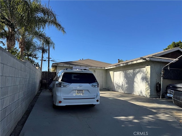 exterior space with a garage