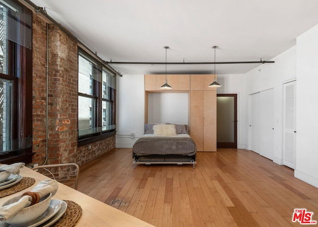 bedroom featuring light hardwood / wood-style floors