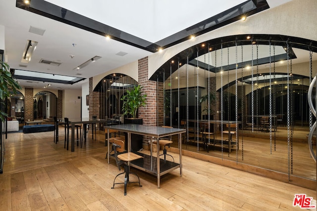 dining area featuring hardwood / wood-style floors