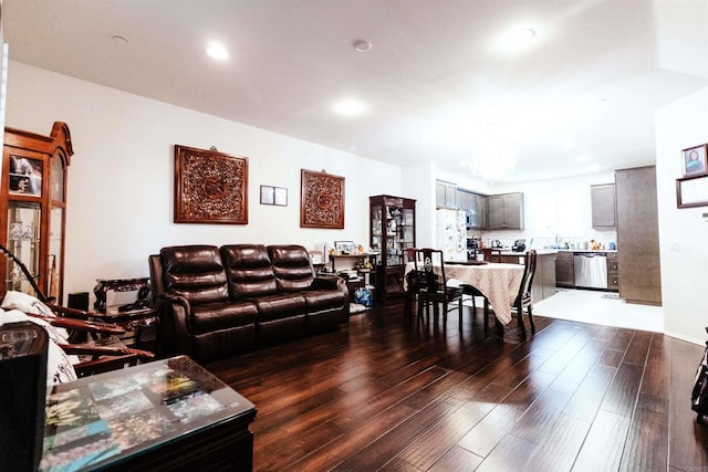 living room featuring dark hardwood / wood-style flooring