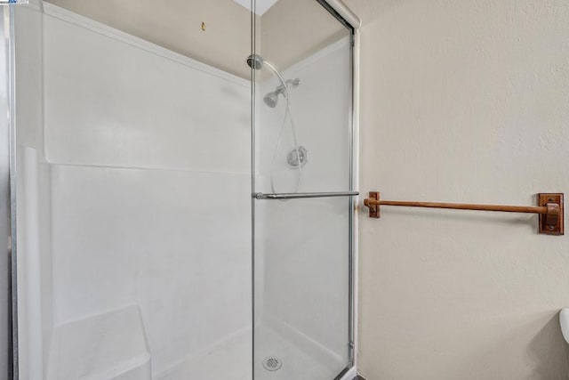 bathroom featuring walk in shower