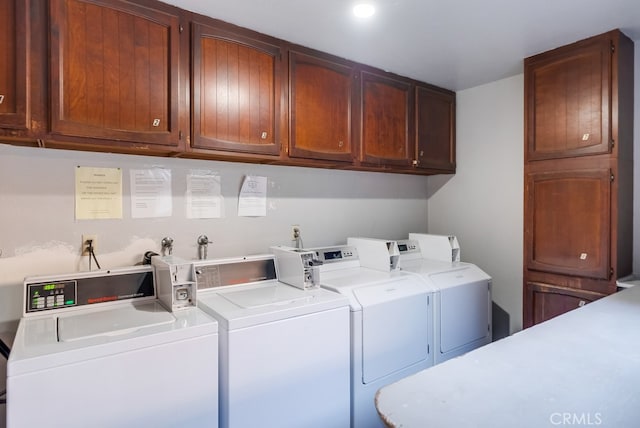 washroom featuring washer and clothes dryer