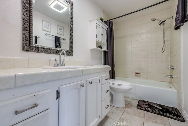 full bathroom with vanity, tile patterned flooring, toilet, and shower / bath combo with shower curtain