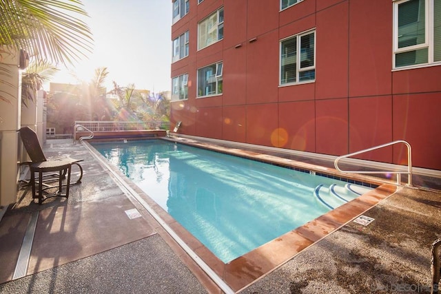 view of pool with a patio area