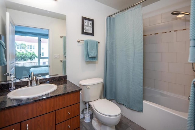 full bathroom with toilet, shower / bath combo, and vanity