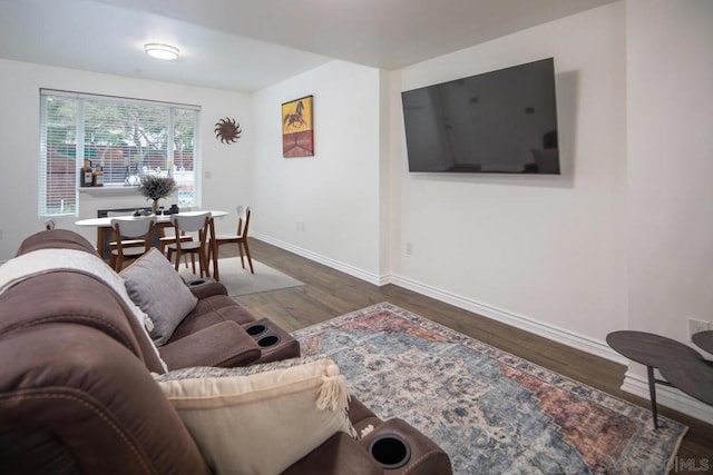 living room featuring dark hardwood / wood-style floors