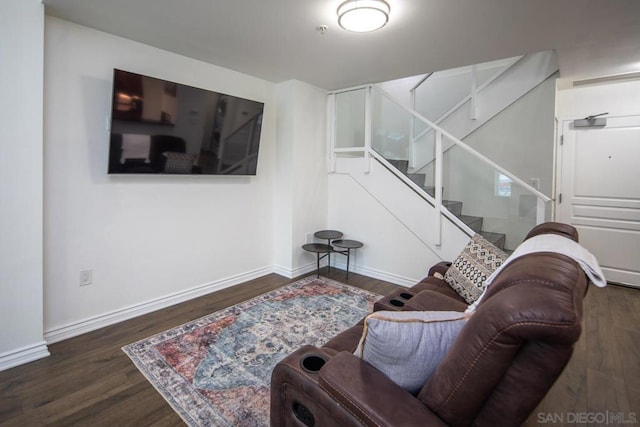 living room with dark hardwood / wood-style floors