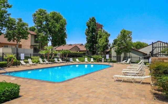 view of swimming pool featuring a patio