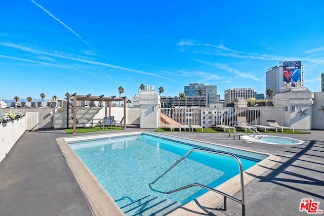 view of pool featuring a patio