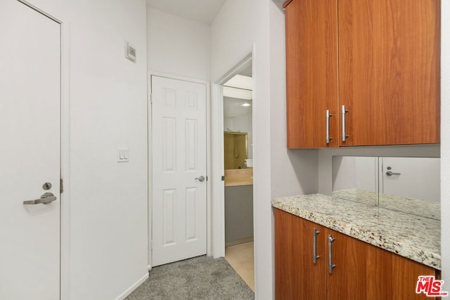 interior space featuring light colored carpet