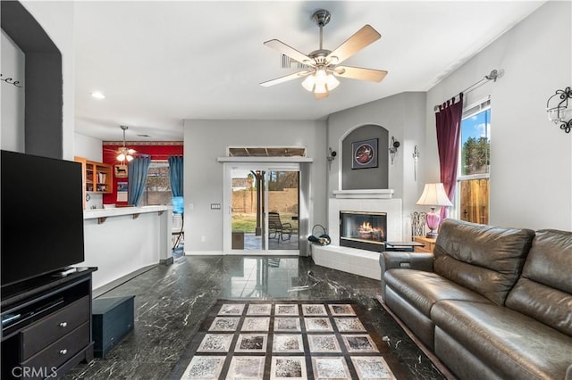 living room featuring ceiling fan