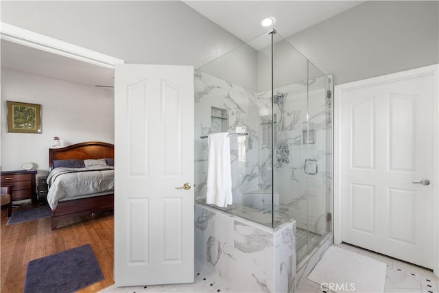 bathroom featuring an enclosed shower