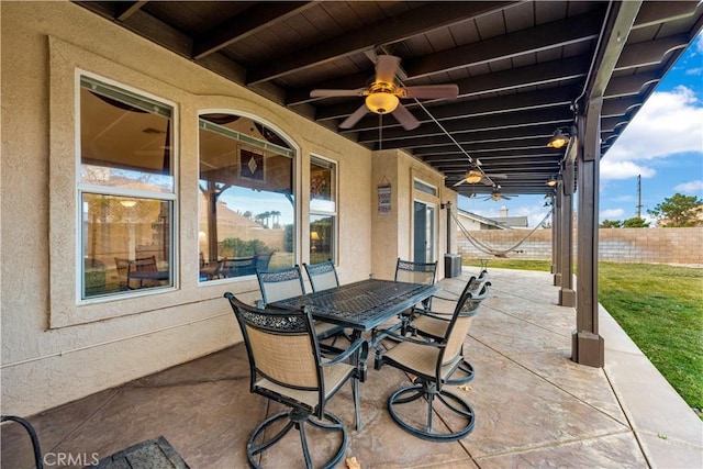 view of patio / terrace featuring ceiling fan