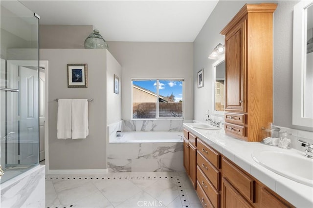 bathroom featuring vanity, tile patterned floors, and independent shower and bath