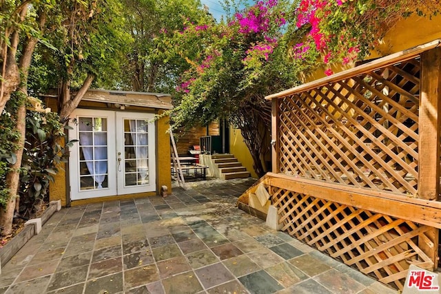 exterior space with a patio area and french doors