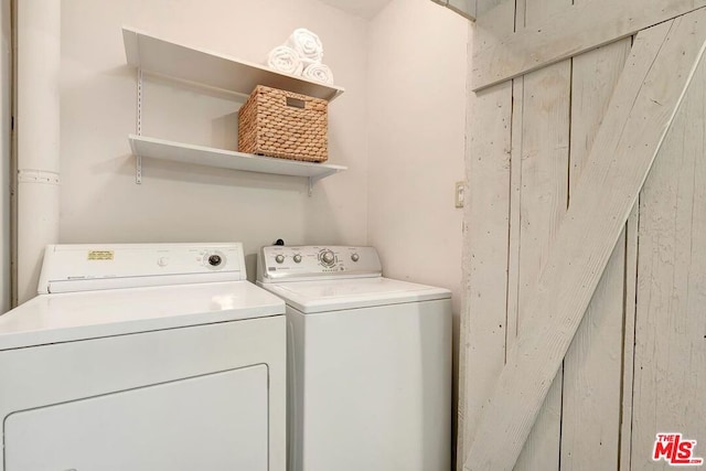 laundry room featuring independent washer and dryer