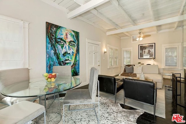 dining space featuring beam ceiling and ceiling fan