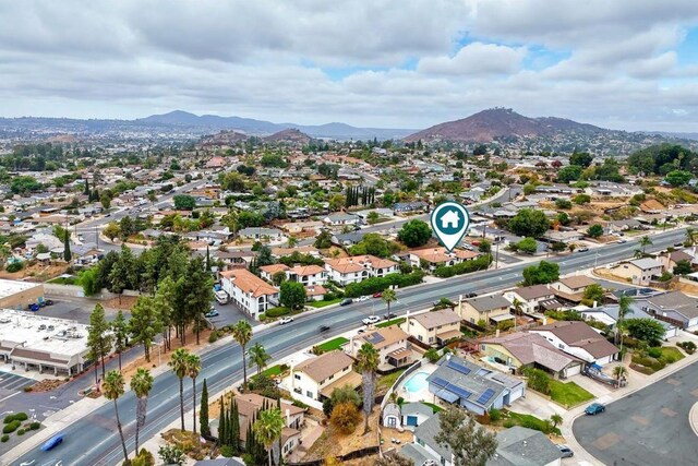 drone / aerial view featuring a mountain view