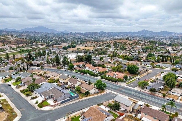 drone / aerial view featuring a mountain view