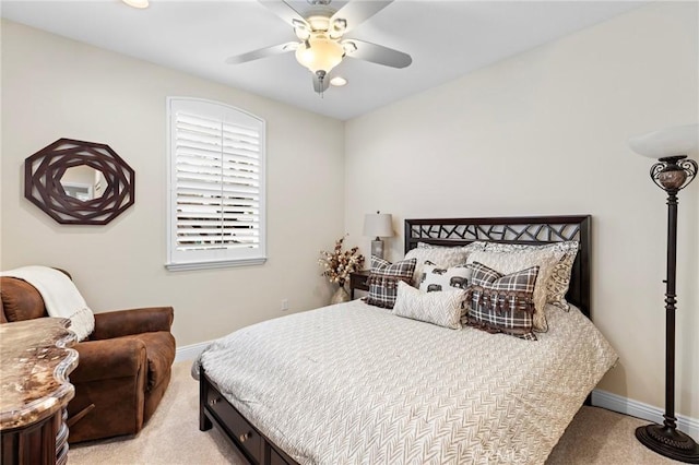 bedroom with light colored carpet and ceiling fan