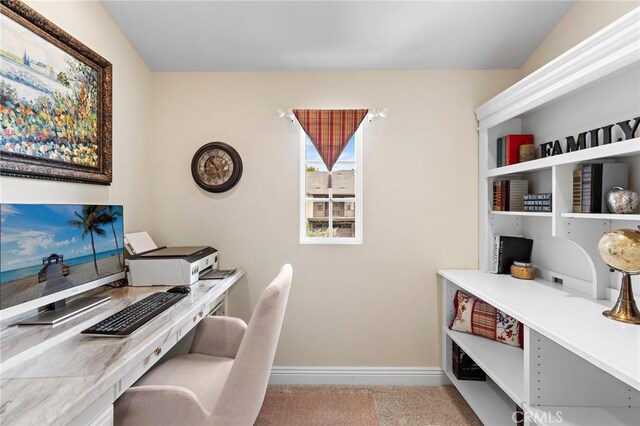 office space with light colored carpet