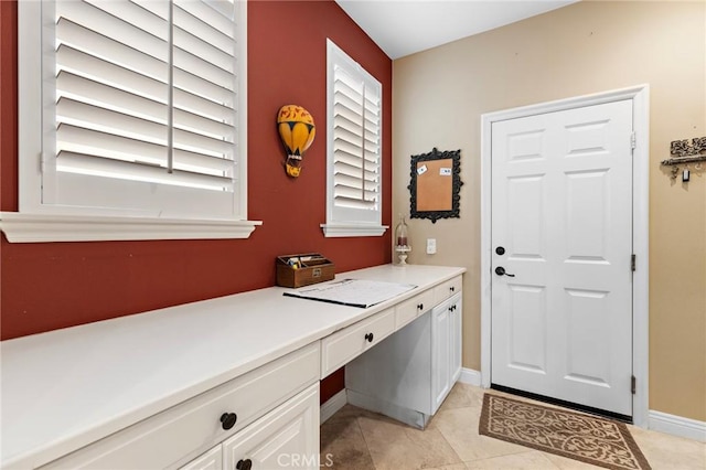 bathroom with tile patterned floors