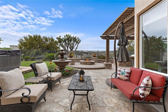 view of patio featuring a pergola and an outdoor living space with a fire pit