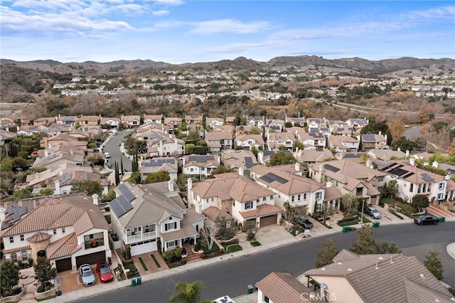 bird's eye view with a mountain view