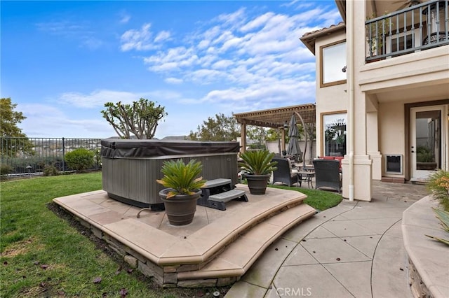 view of patio / terrace featuring a balcony, a hot tub, and a pergola