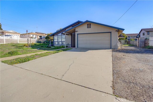 view of front of property featuring a garage