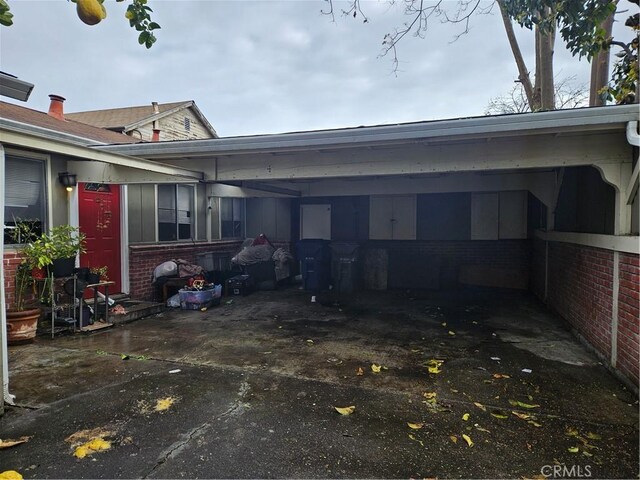 exterior space featuring a carport