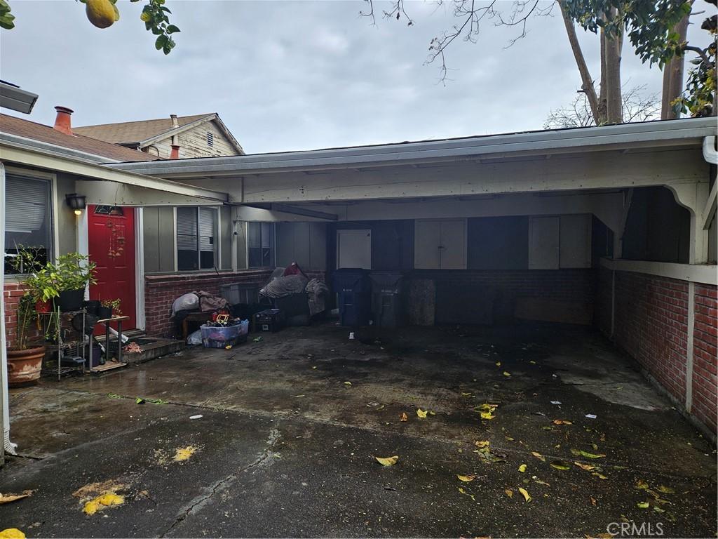 exterior space with a carport