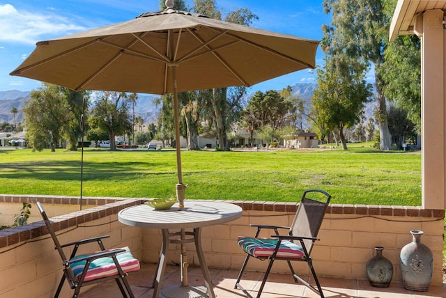 view of patio with a mountain view