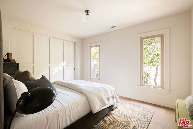 bedroom featuring light hardwood / wood-style flooring