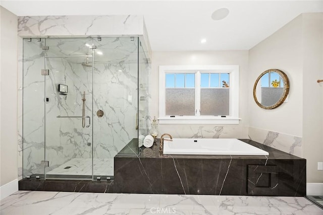 bathroom featuring separate shower and tub and sink