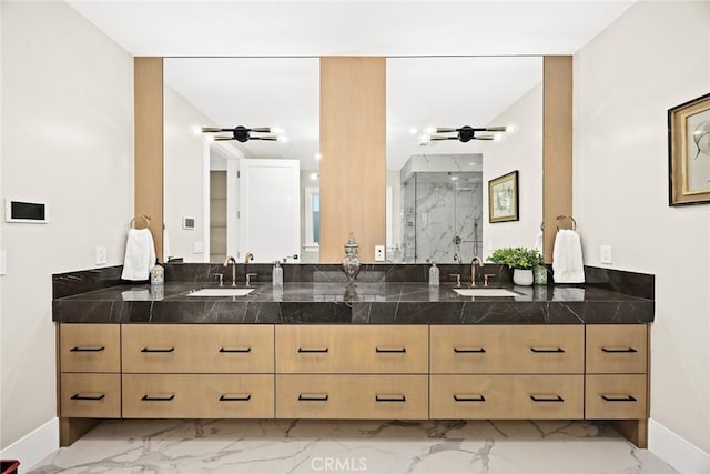 bathroom featuring vanity and a shower with door