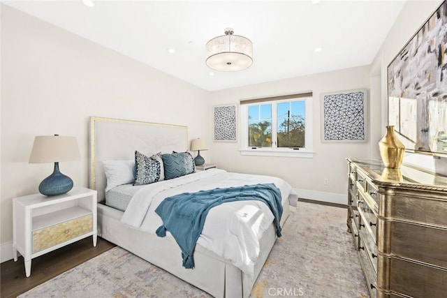 bedroom featuring hardwood / wood-style flooring