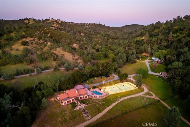 view of aerial view at dusk