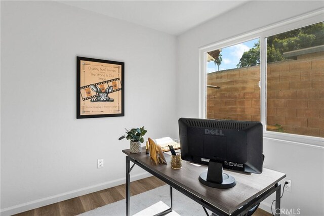 office with hardwood / wood-style floors