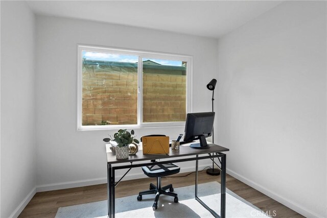 office featuring hardwood / wood-style flooring