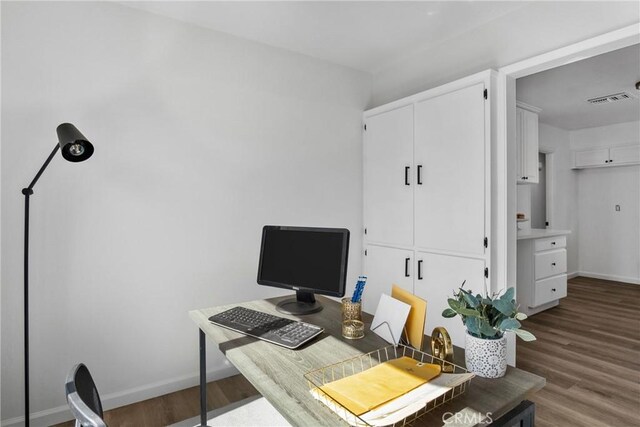 office space with hardwood / wood-style flooring