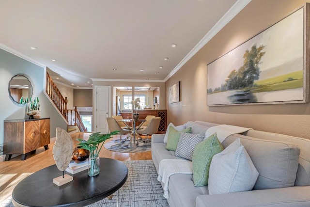 living room with crown molding and wood-type flooring