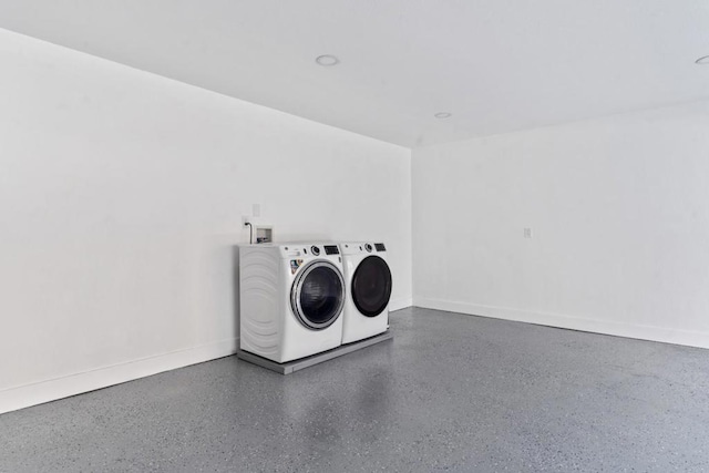 laundry room featuring separate washer and dryer