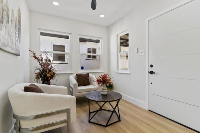 sitting room featuring light hardwood / wood-style flooring