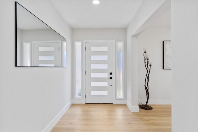 entrance foyer featuring light wood-type flooring